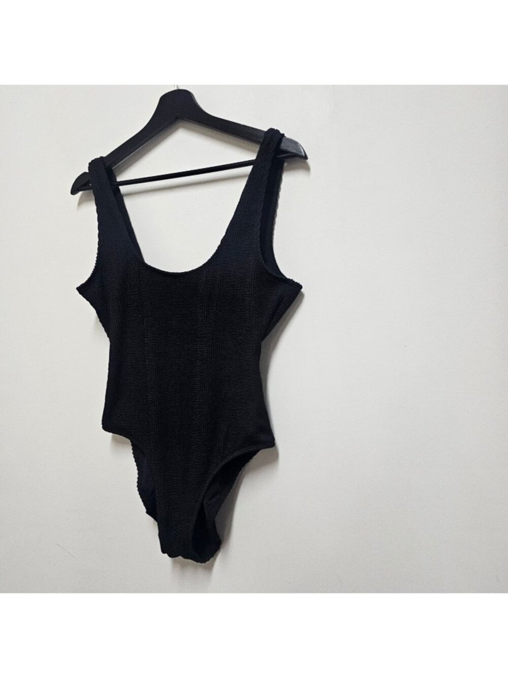 Good American Always Fits One-Piece Swimsuit in a black crinkle-textured